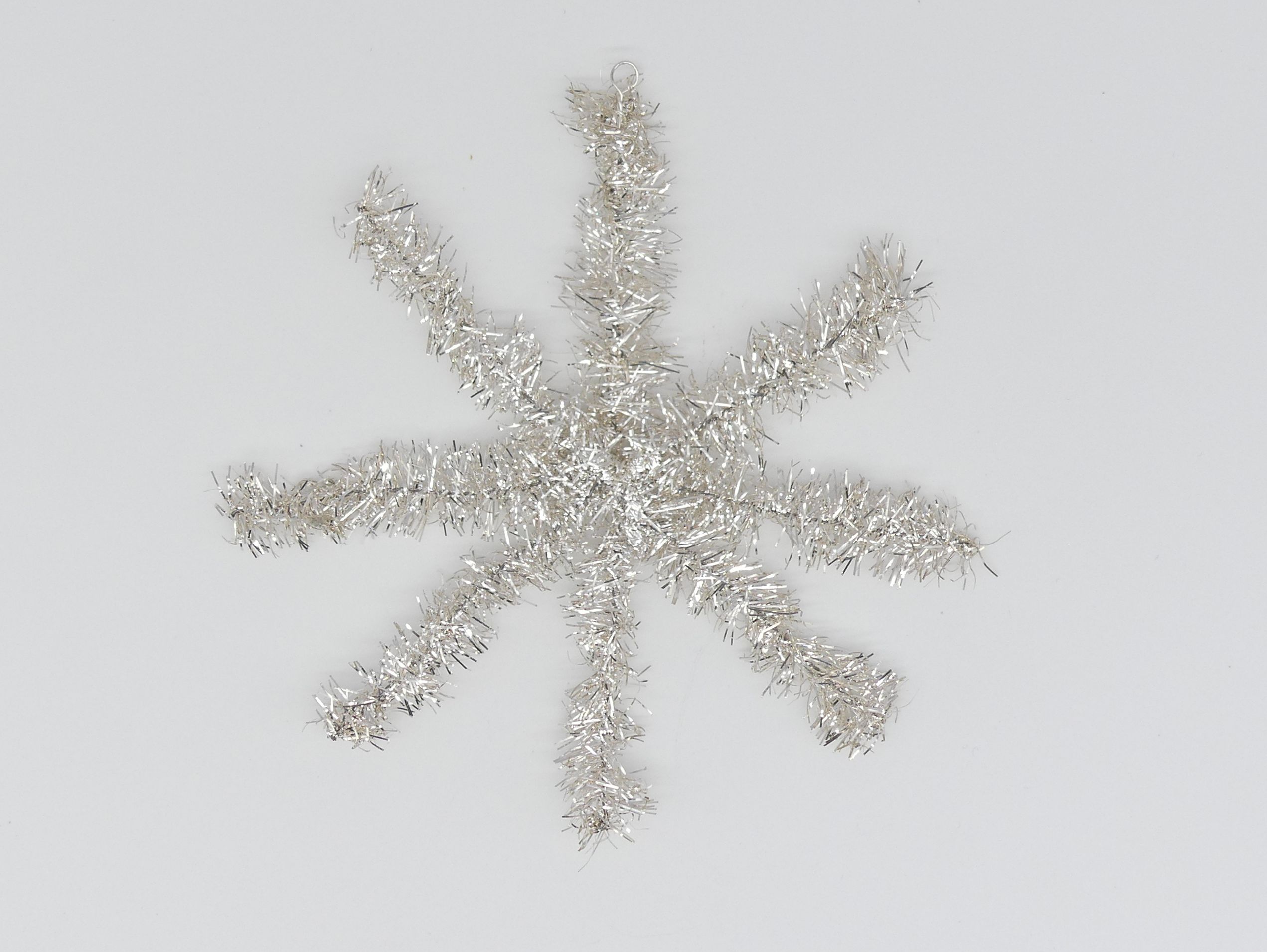 stern_12cm_silber Lamettagirlandenstern 12cm silber Weihnachtsschmuck Antik & Modern